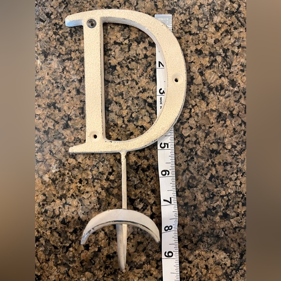 Cream/off white metal hanging letter “D” to hang towels, keys, or clothes on. - Picture 3 of 7